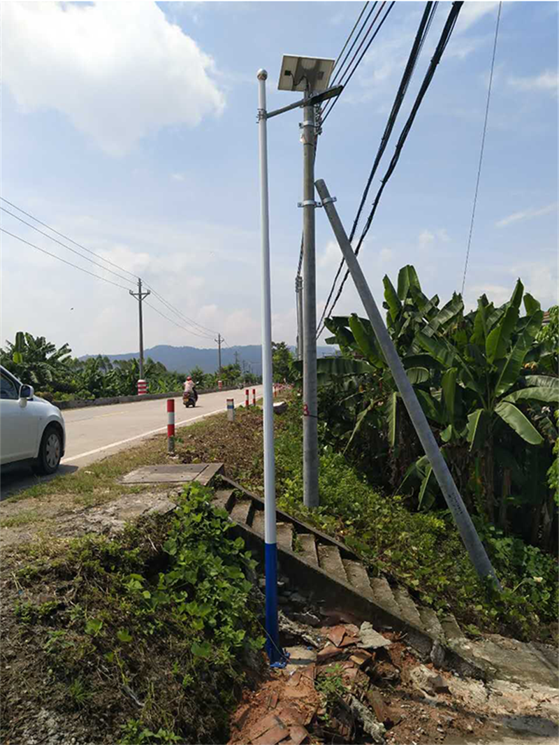 Solar-powered street lamps are installed in a village in Yunfu